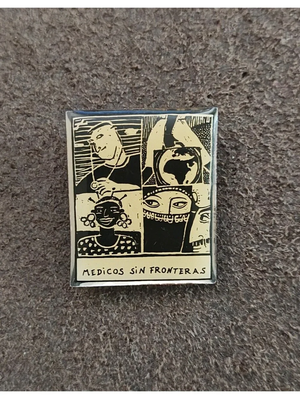 1990s Médicos Sin Fronteras (Doctors Without Borders) Silver Tone Enamel Pin